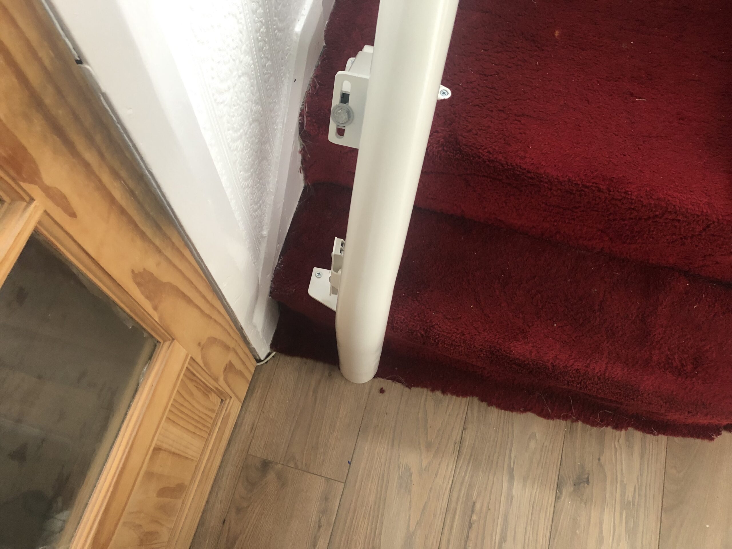 stair lift door at top of stairs
