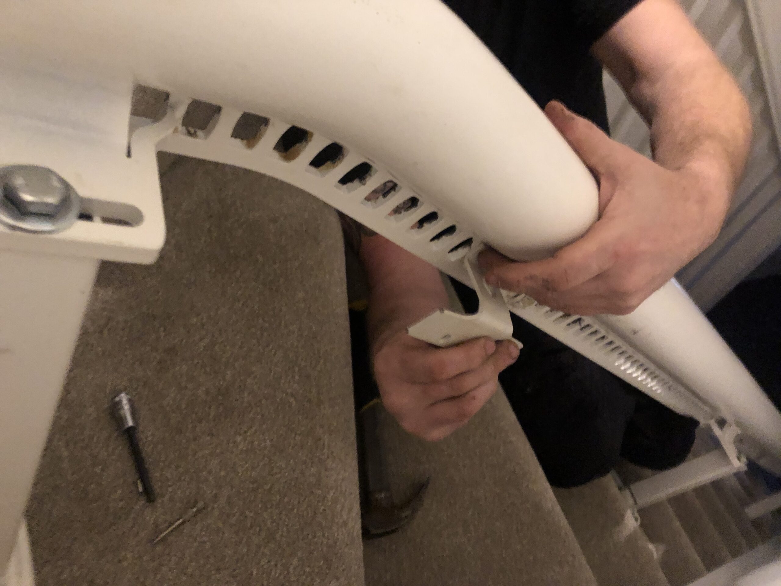 positioning new charge point on a stairlift repair