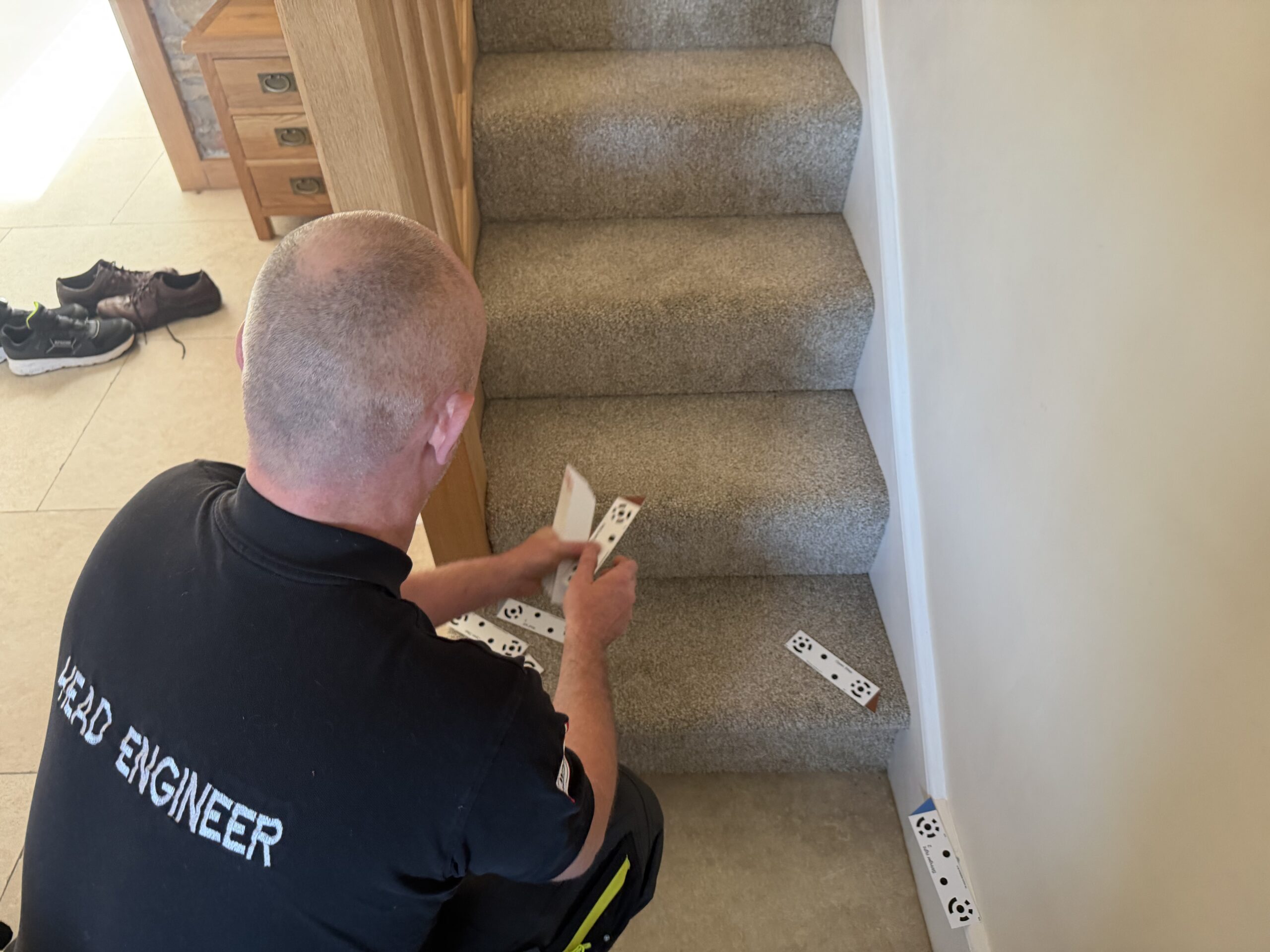 photographic stairlift survey - placing markers during a photo survey